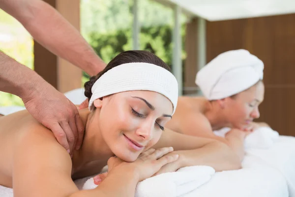Pretty friends getting massages together — Stock Photo, Image
