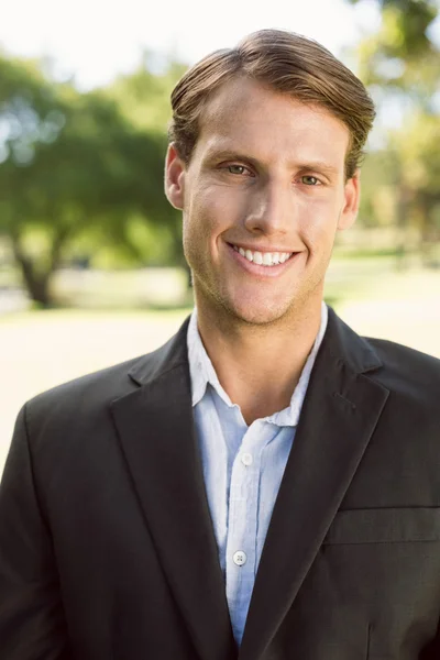 Businessman in the park — Stock Photo, Image