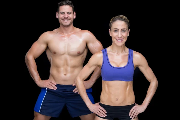 Casal Crossfit com as mãos nos quadris — Fotografia de Stock