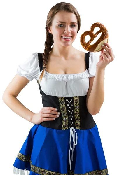 Pretty oktoberfest girl holding pretzel — Stock Photo, Image