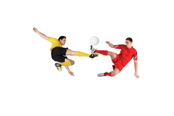 Football players tackling for the ball — Stock Photo, Image