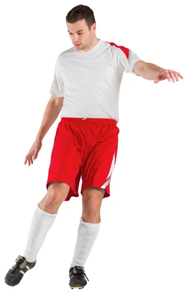白い蹴るのフットボール選手 — ストック写真