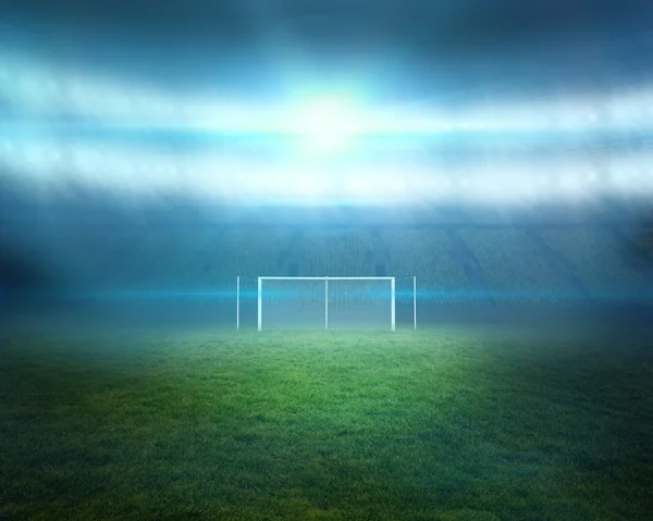 Fotbollsplan med ljus och goalpost — Stockfoto