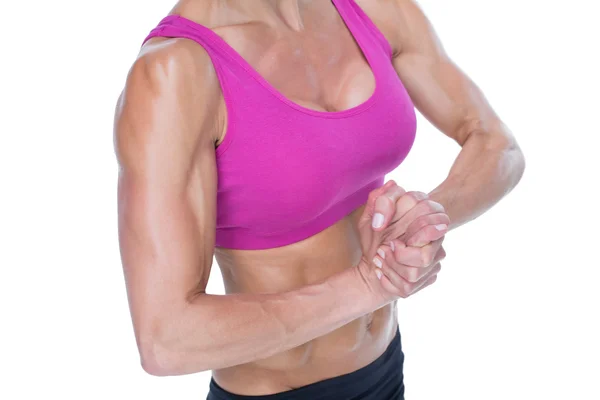 Female bodybuilder flexing mid section — Stock Photo, Image