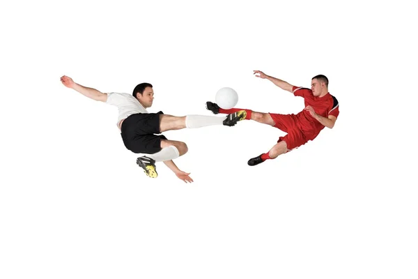 Jogadores de futebol atacando para a bola — Fotografia de Stock