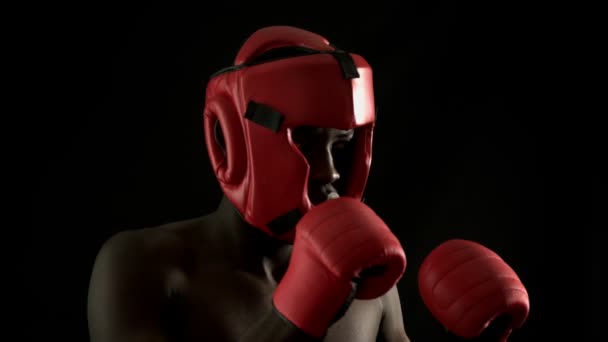 Tough boxer punching with gloves — Stock Video