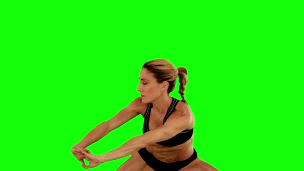 Super fit woman doing sumo squats — Stock Video