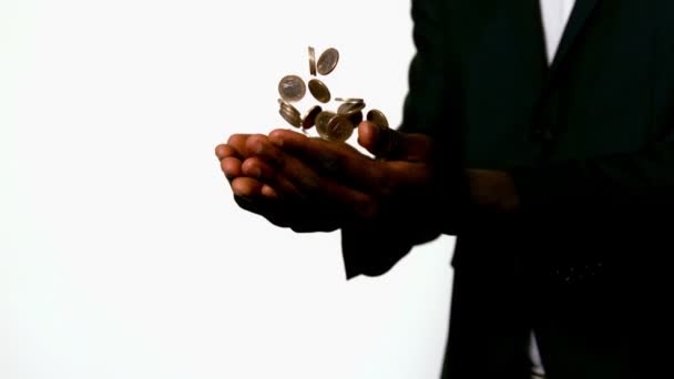 Businessman catching falling coins — Stock Video