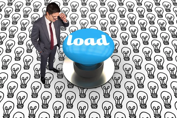 Load against blue push button — Stock Photo, Image