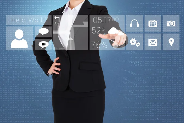 Businesswoman pointing finger to app menu — Stock Photo, Image