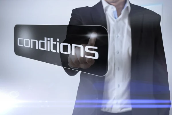 Businessman pointing to word conditions — Stock Photo, Image