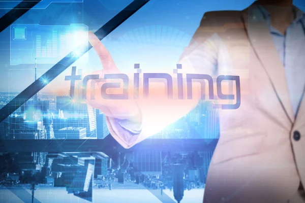 Businesswoman presenting the word training — Stock Photo, Image