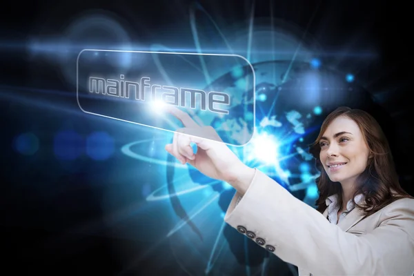 Businesswoman pointing to word mainframe — Stock Photo, Image