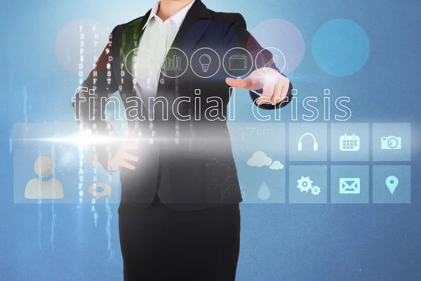 Businesswoman touching the words financial crisis — Stock Photo, Image