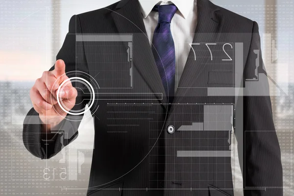Businessman pointing finger to interface — Stock Photo, Image