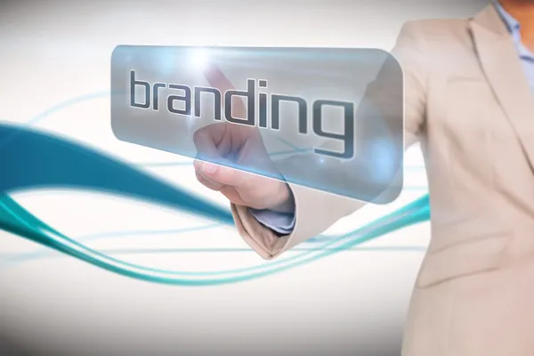 Empresaria señalando a la palabra branding — Foto de Stock