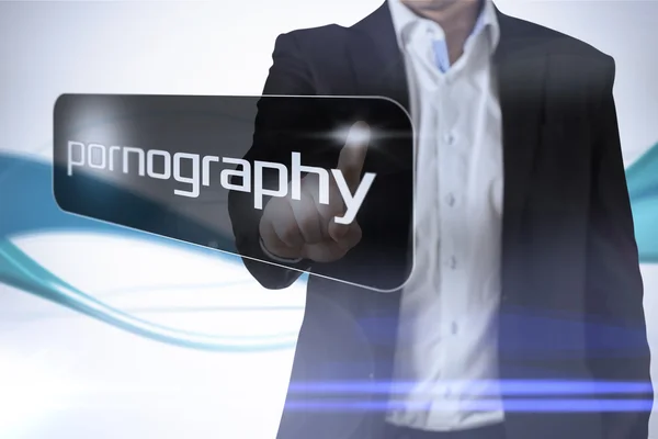 Businessman pointing to word pornography — Stock Photo, Image