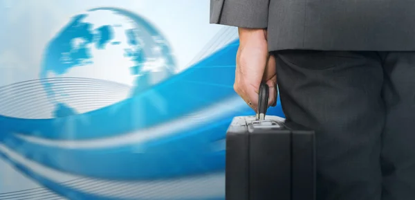 Businessman holding briefcase — Stock Photo, Image