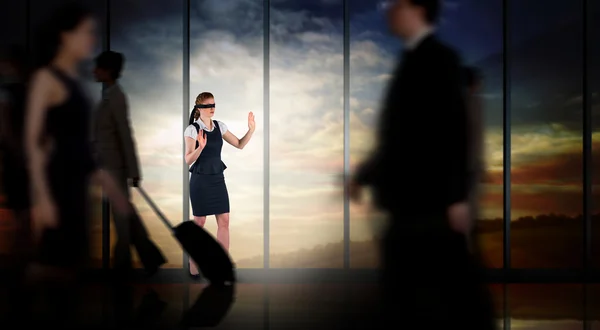 Redhead businesswoman in a blindfold — Stock Photo, Image