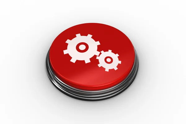 Composite image of cog and wheel graphic on button — Stock Photo, Image