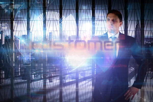 Businessman presenting the word customer — Stock Photo, Image