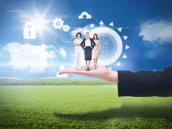 Businesswomen against sunny landscape — Stock Photo, Image