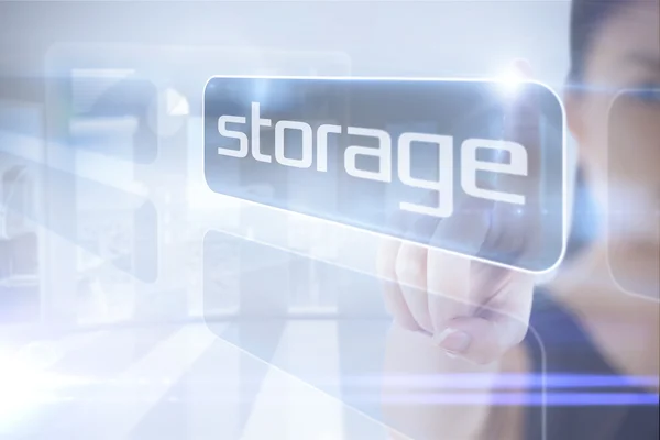 Businesswoman pointing to word storage — Stock Photo, Image