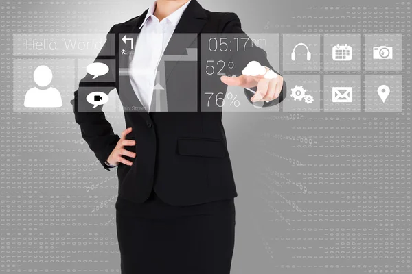 Businesswoman pointing finger to app menu — Stock Photo, Image