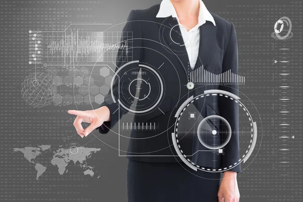 Businesswoman pointing at interface — Stock Photo, Image