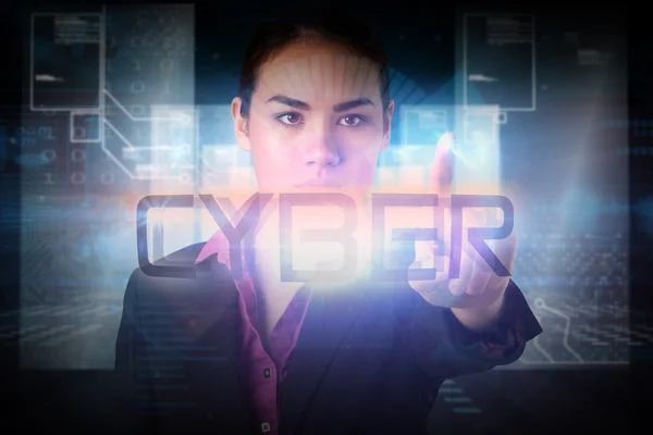 Businesswoman pointing to the word cyber — Stock Photo, Image