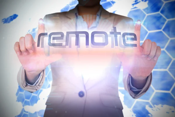 Empresaria presentando la palabra control remoto — Foto de Stock