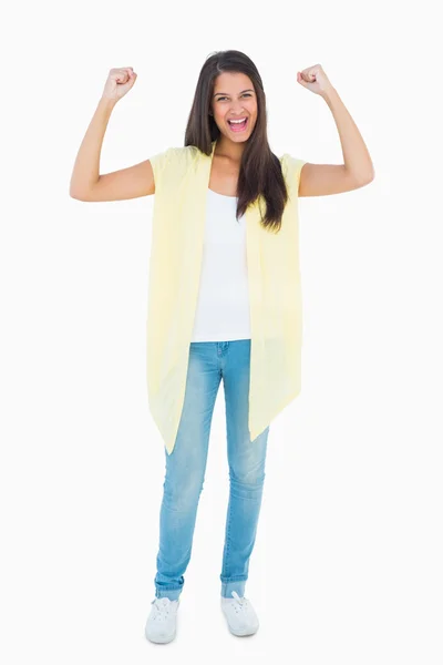 Happy casual woman cheering at camera — Stock Photo, Image