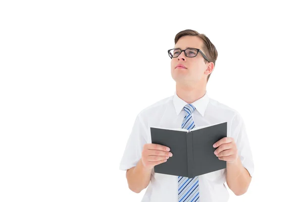Geeky businessman reading from book — Stock Photo, Image