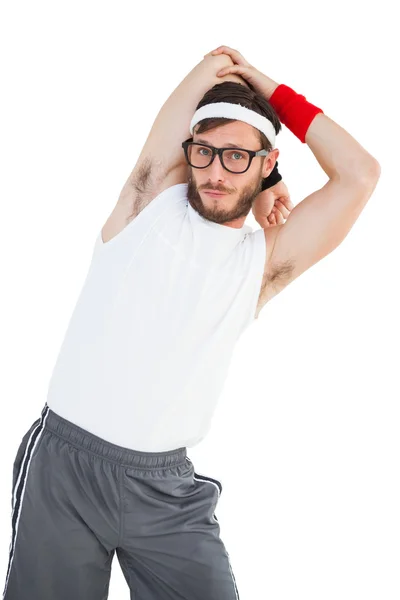 Geeky hipster estirándose en ropa deportiva — Foto de Stock