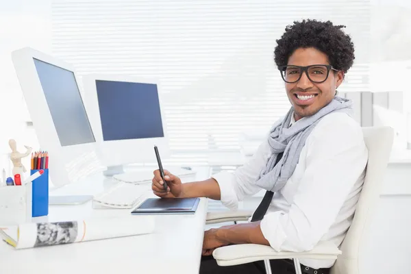 Hipster businessman working at his desk — Stock Photo, Image