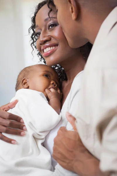 Happy parents spending time with baby — Stock Photo, Image