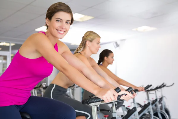 Spin class working out in a row — Stock Photo, Image