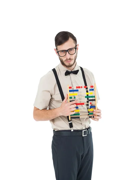 Geeky hipster sosteniendo un ábaco — Foto de Stock