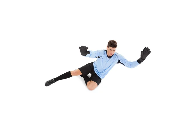 Goalkeeper in blue making a save — Stock Photo, Image