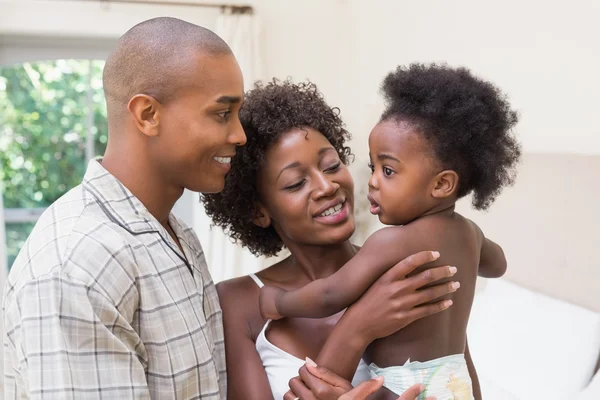 Happy couple with baby daughter — Stock Photo, Image