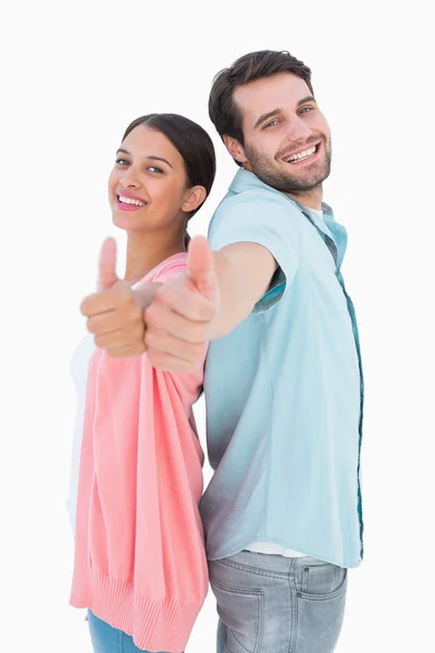 Pareja feliz mostrando pulgares hacia arriba —  Fotos de Stock