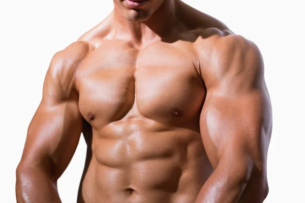 Mid section of a shirtless muscular man — Stock Photo, Image