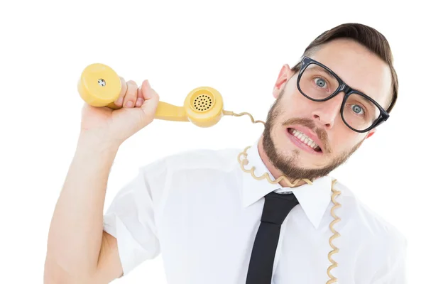 Geeky zakenman wordt gewurgd door telefoonkabel — Stockfoto