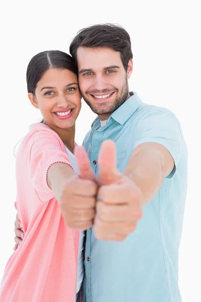 Lyckliga paret visar tummen — Stockfoto