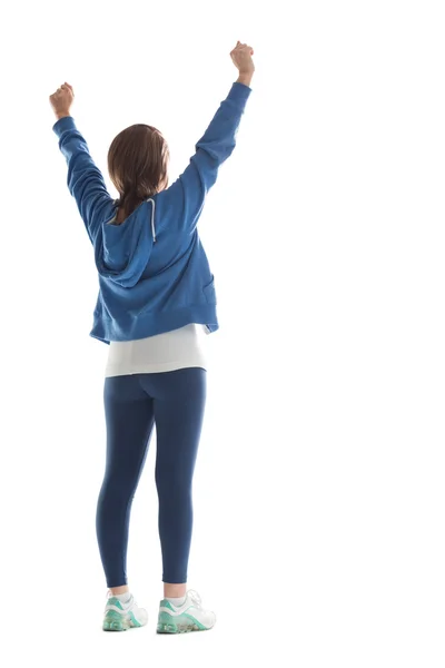 Achteraanzicht van jonge vrouw die haar handen uitrekken — Stockfoto