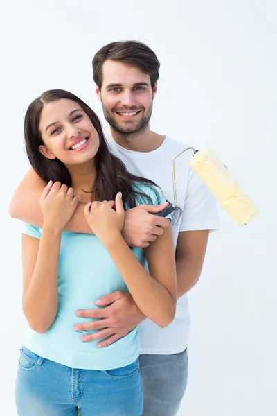 Feliz jovem casal pintura juntos — Fotografia de Stock