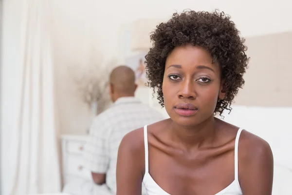 Unhappy couple not speaking to each other on bed — Stock Photo, Image