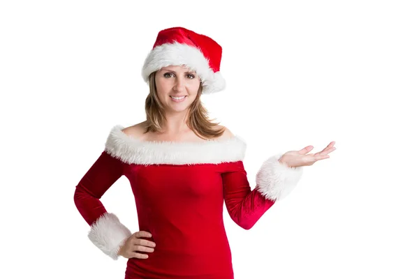 Bella donna in costume da Babbo Natale che presenta il prodotto — Foto Stock