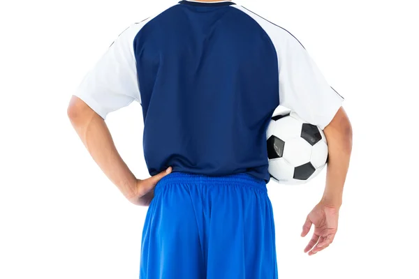 Jugador de fútbol en pelota de celebración azul — Foto de Stock