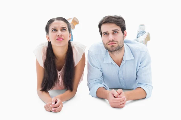 Attractive young couple looking up — Stock Photo, Image